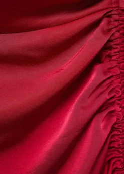 Asymmetrical satin dress with side