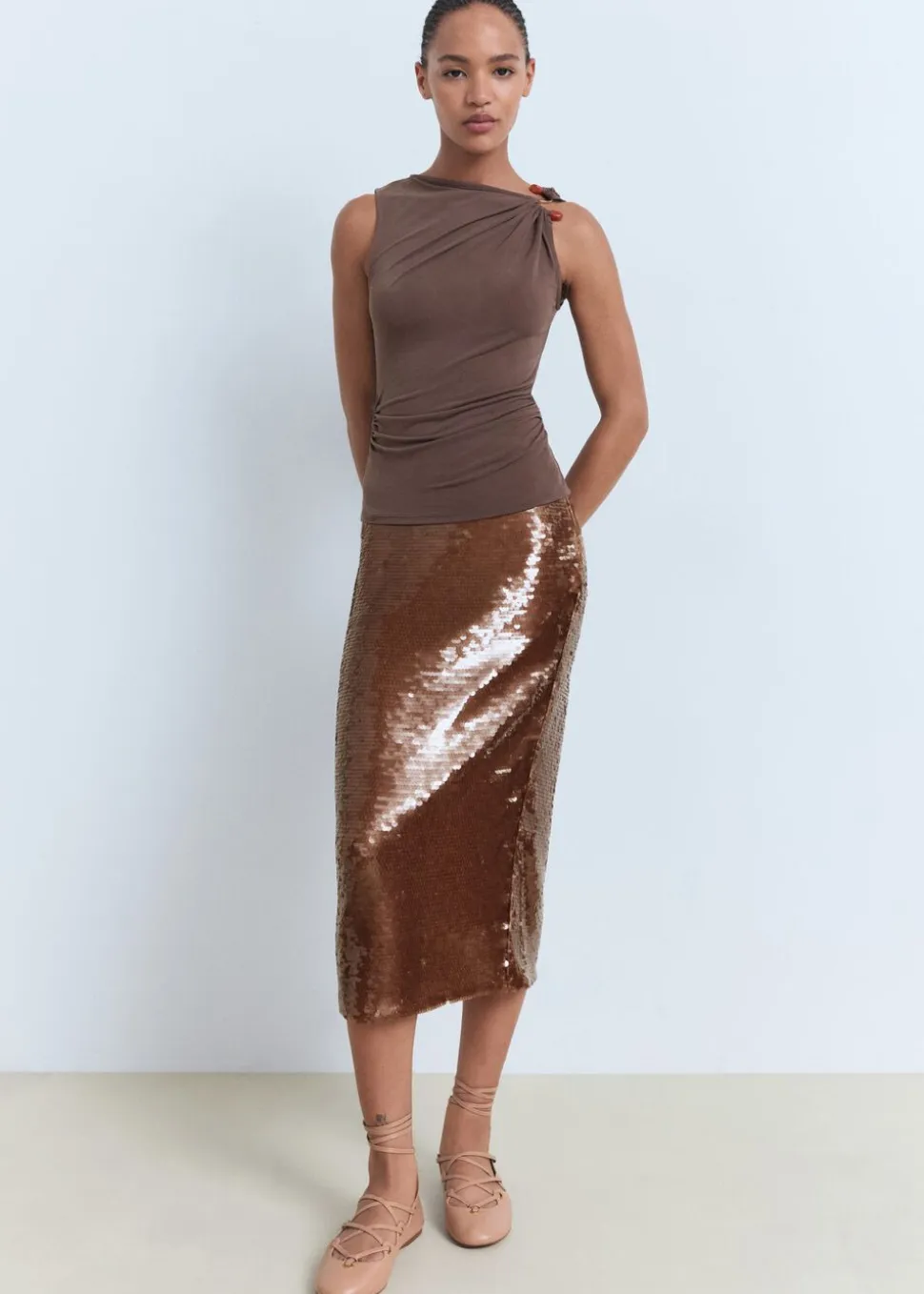 Lurex knitted top with crossed back