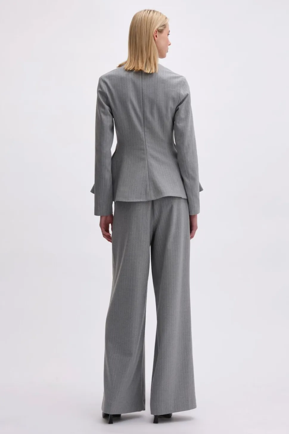 PEPLUM TOP WITH LONG SLEEVES